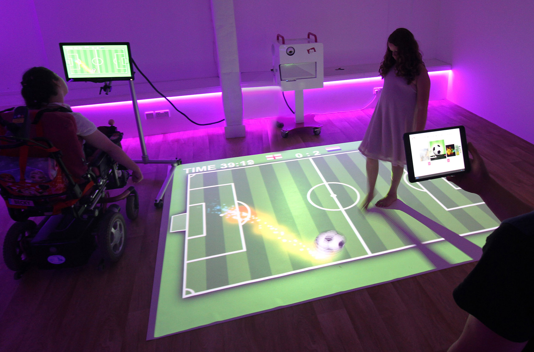 children play soccer game for sensory room